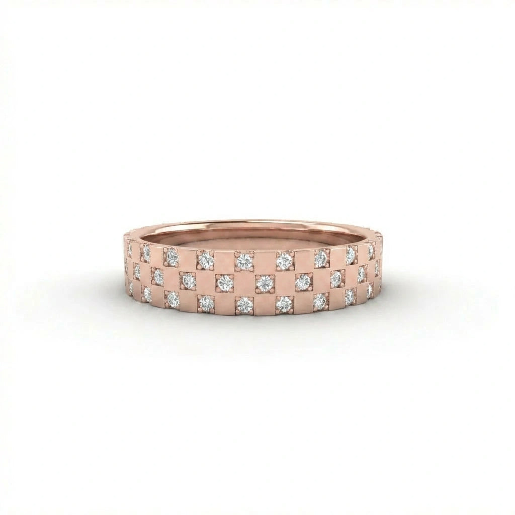 Cyrus Tessera diamond band in 14K rose gold with tessera tile pattern of gold squares and flush set round diamonds