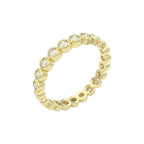 Diamond eternity ring 3mm bezel set in 14k yellow gold, angled view