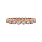 Diamond eternity ring 3mm bezel set in 14k rose gold, closed up view