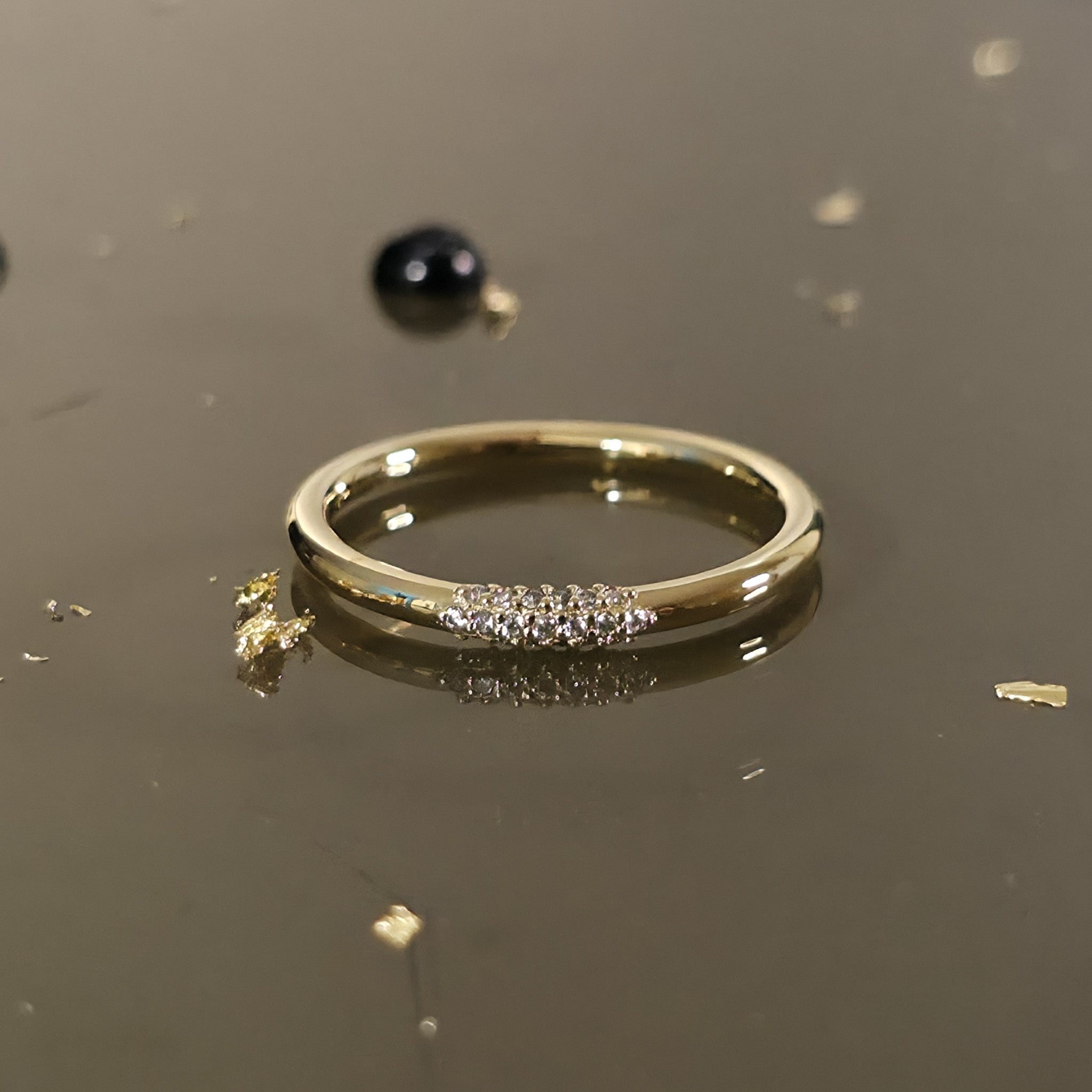 2mm 14K gold diamond wire ring with petite diamond cluster – minimalist wire wedding ring handcrafted in New York