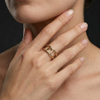 Double loop gold ring in 14K gold shown in four lifestyle settings — Black Pearl of Queens