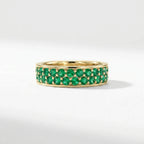 Emerald double row eternity ring in 14K yellow gold with continuous pavé gemstone design