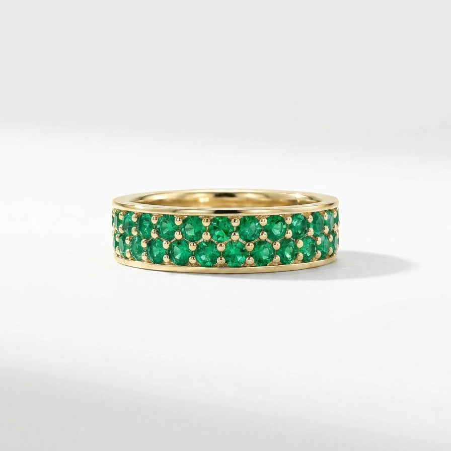 Emerald double row eternity ring in 14K yellow gold with continuous pavé gemstone design