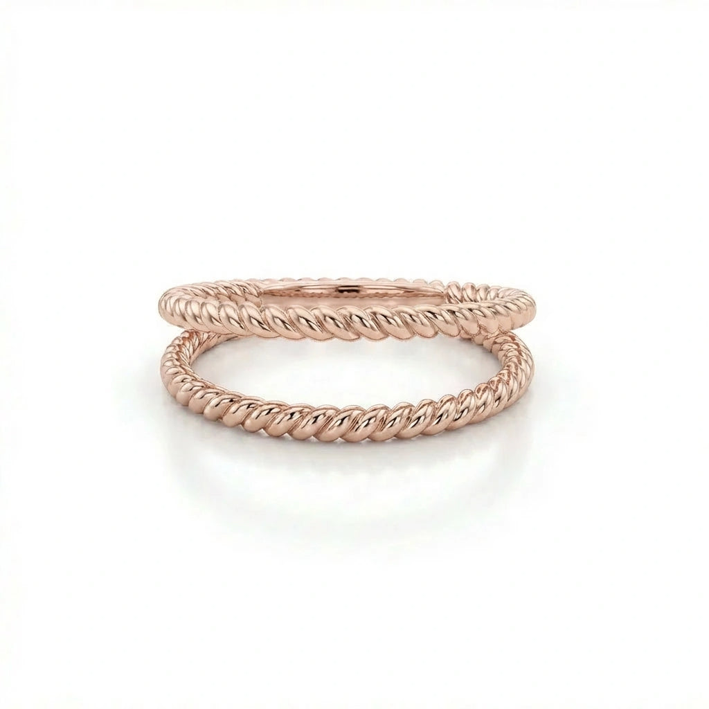 Women’s rope band in 14K rose gold with twisted pattern and smooth polished finish
