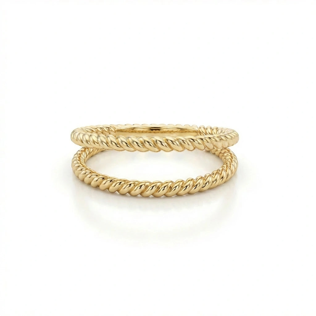 Women’s rope ring in solid 14K yellow gold with twisted design and polished finish