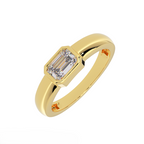 bezel set emerald cut diamond ring showing low profile – angled view