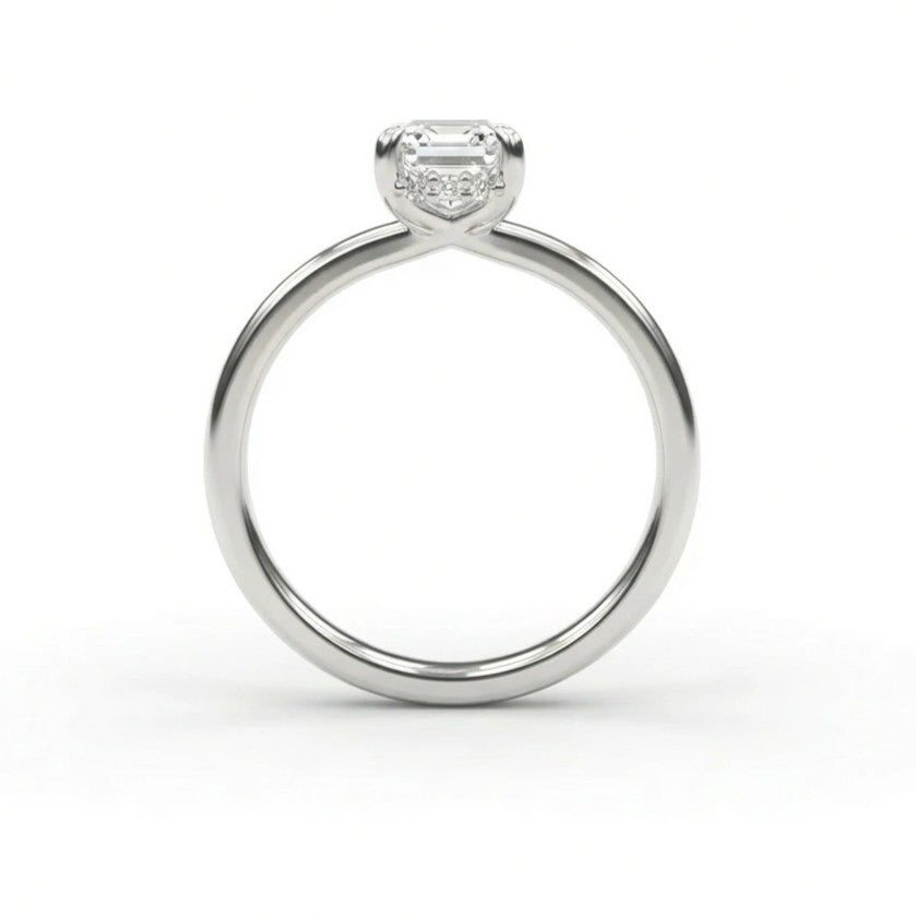 Emerald-cut diamond hidden halo engagement ring side view in 14K white gold - showing 12 halo diamonds