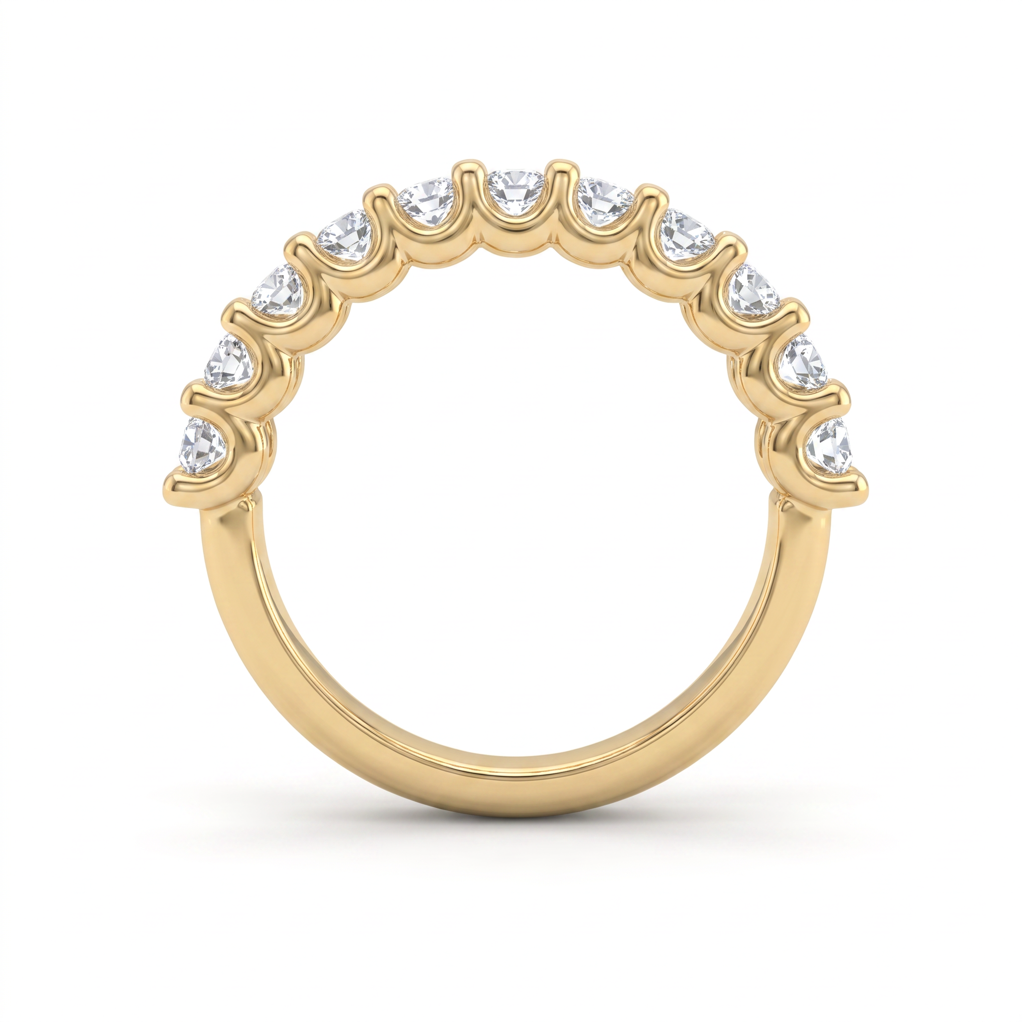 Side profile of the emerald cut diamond wedding band in 14K yellow gold, showing the shared prongs and how low the stones sit against the finger