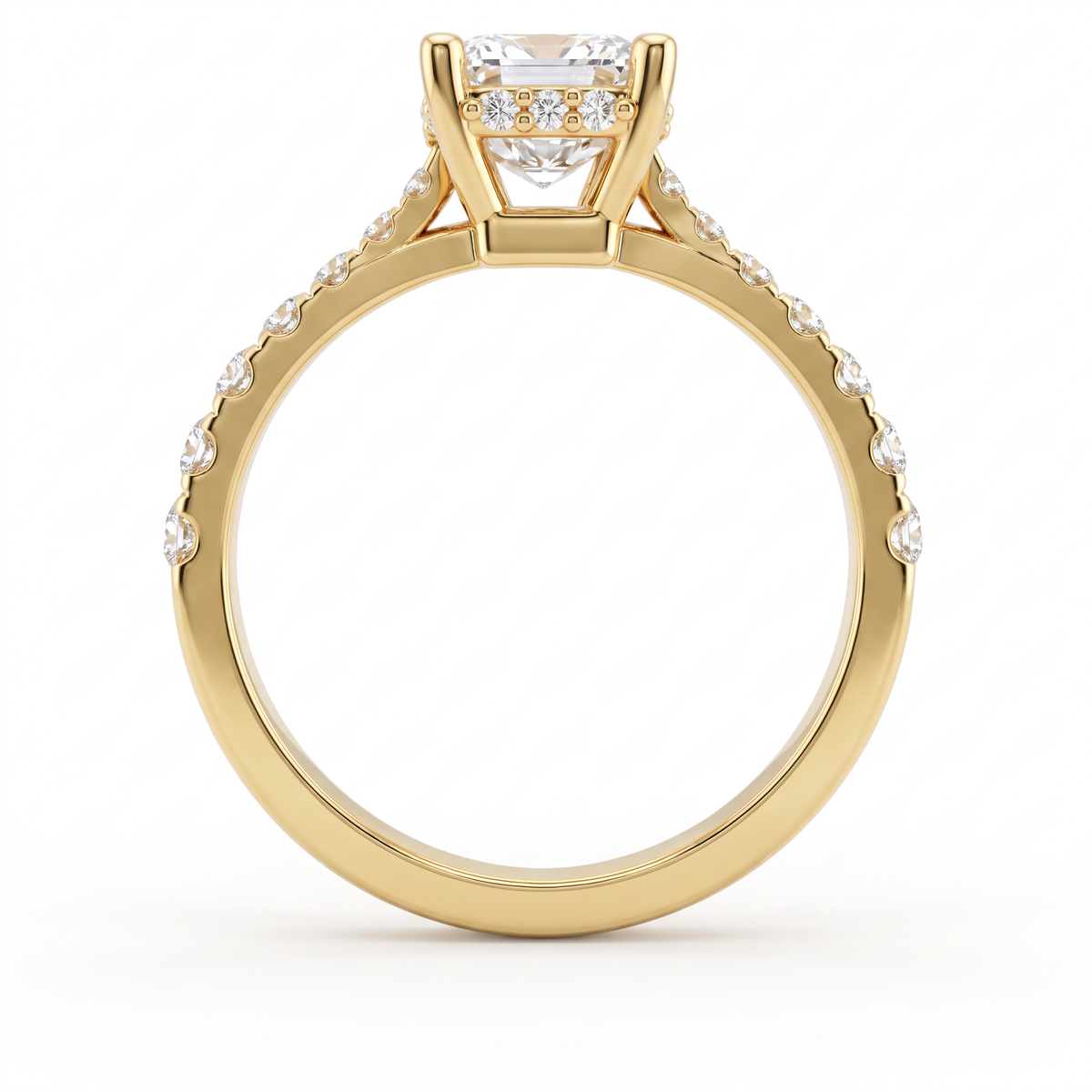 Profile view of a 14K yellow gold Emerald Cut Lab-Grown Diamond engagement ring showing the hidden halo and pavé band