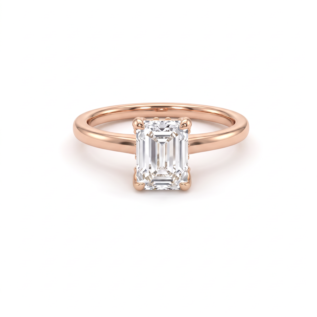 Emerald cut hidden halo engagement ring in 14K rose gold, front view