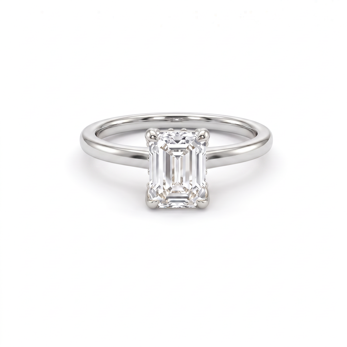 Emerald cut hidden halo engagement ring in 14K white gold, front view