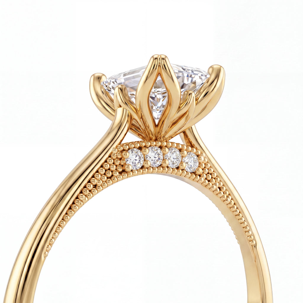 Emerald cut lotus prong milgrain Lab-Grown Diamond engagement ring in 14K yellow gold, close-up of lotus basket showing gallery diamonds and milgrain edging — Black Pearl of Queens