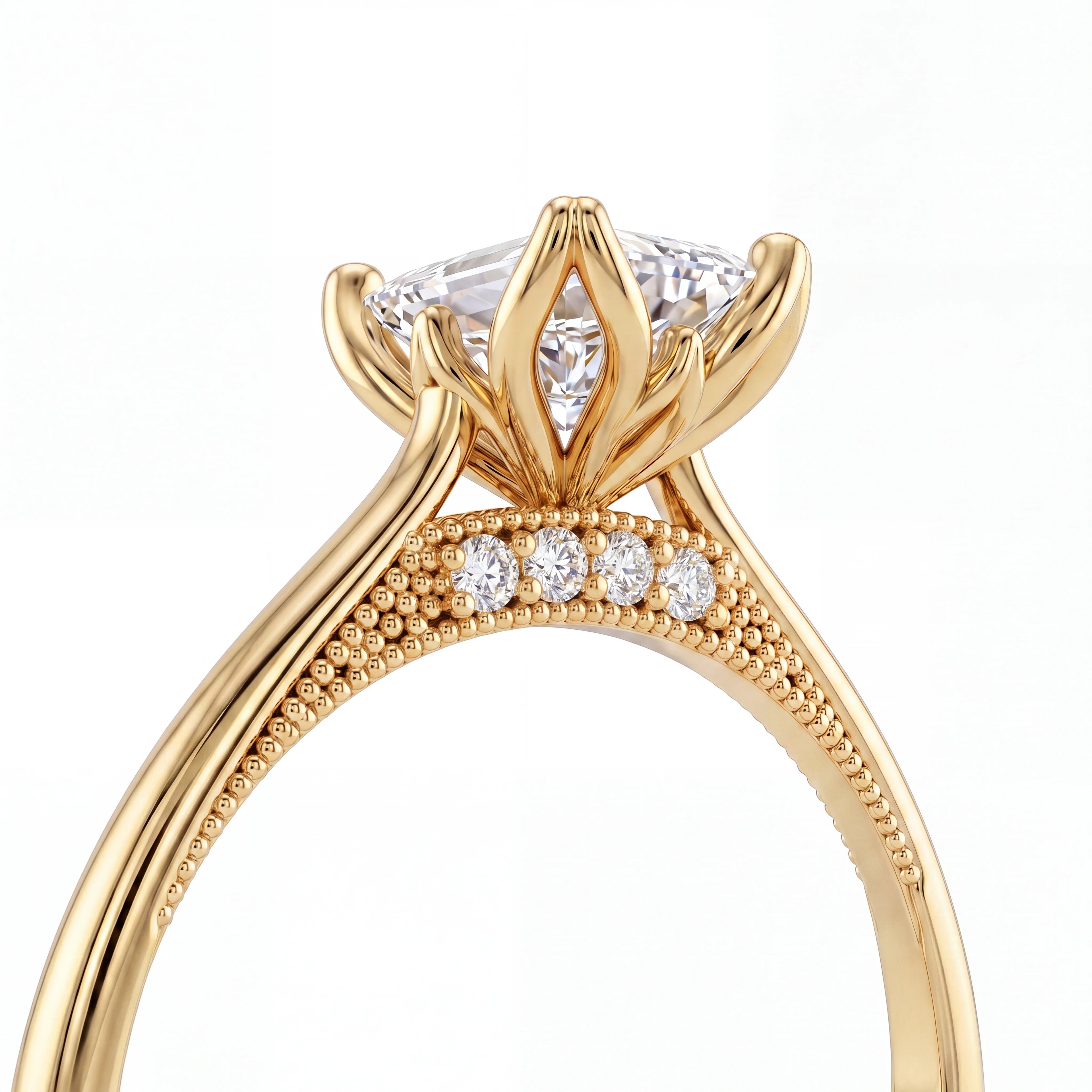 Emerald cut lotus prong milgrain Lab-Grown Diamond engagement ring in 14K yellow gold, close-up of lotus basket showing gallery diamonds and milgrain edging — Black Pearl of Queens