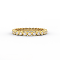 1/3 ct bezel set lab grown diamond eternity wedding band in solid 14K yellow gold – front view