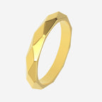 gold faceted womens wedding ring angle view
