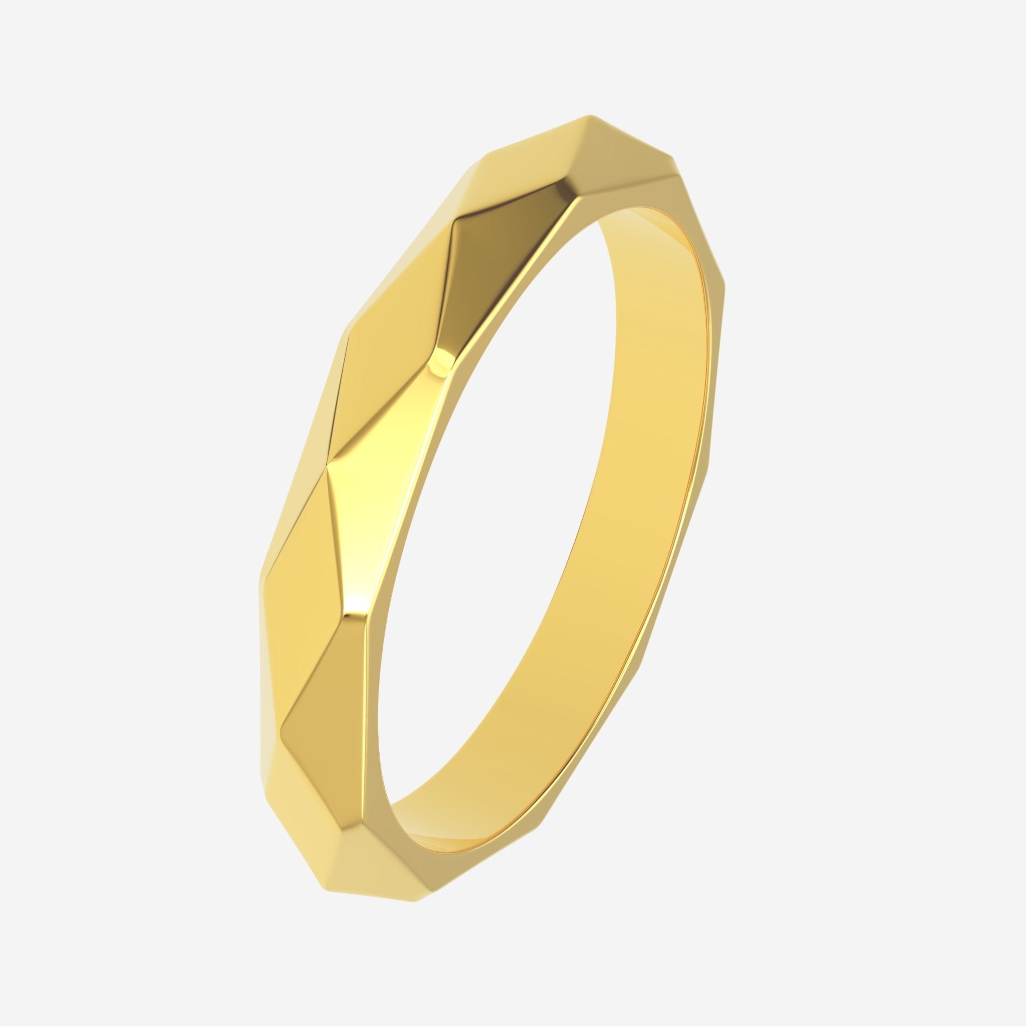 gold faceted womens wedding ring angle view