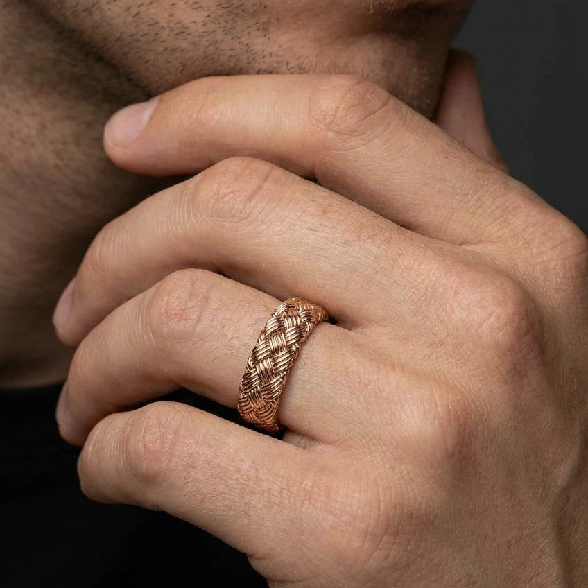 Gold basket weave wedding band in 14K brown gold worn on a man’s hand — Black Pearl of Queens