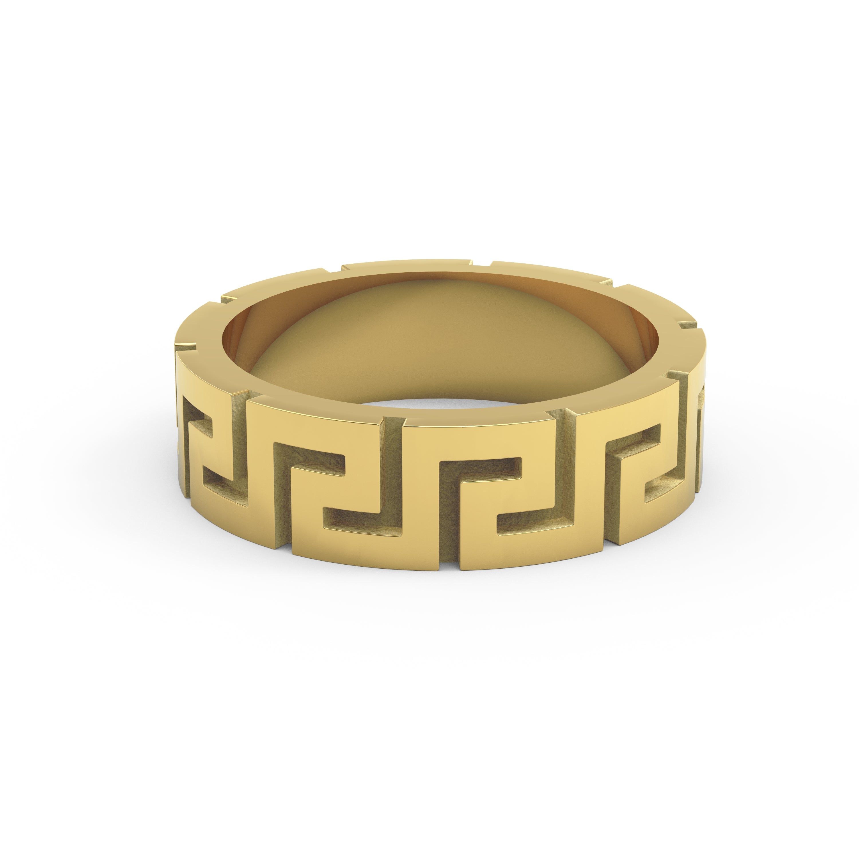 Close-up of solid gold Greek key ring with meander design on white surface