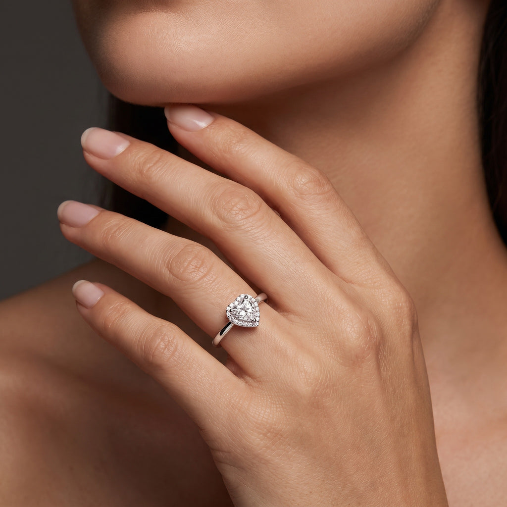 Heart-shaped Lab-Grown Diamond halo ring in 14K white gold worn on the hand