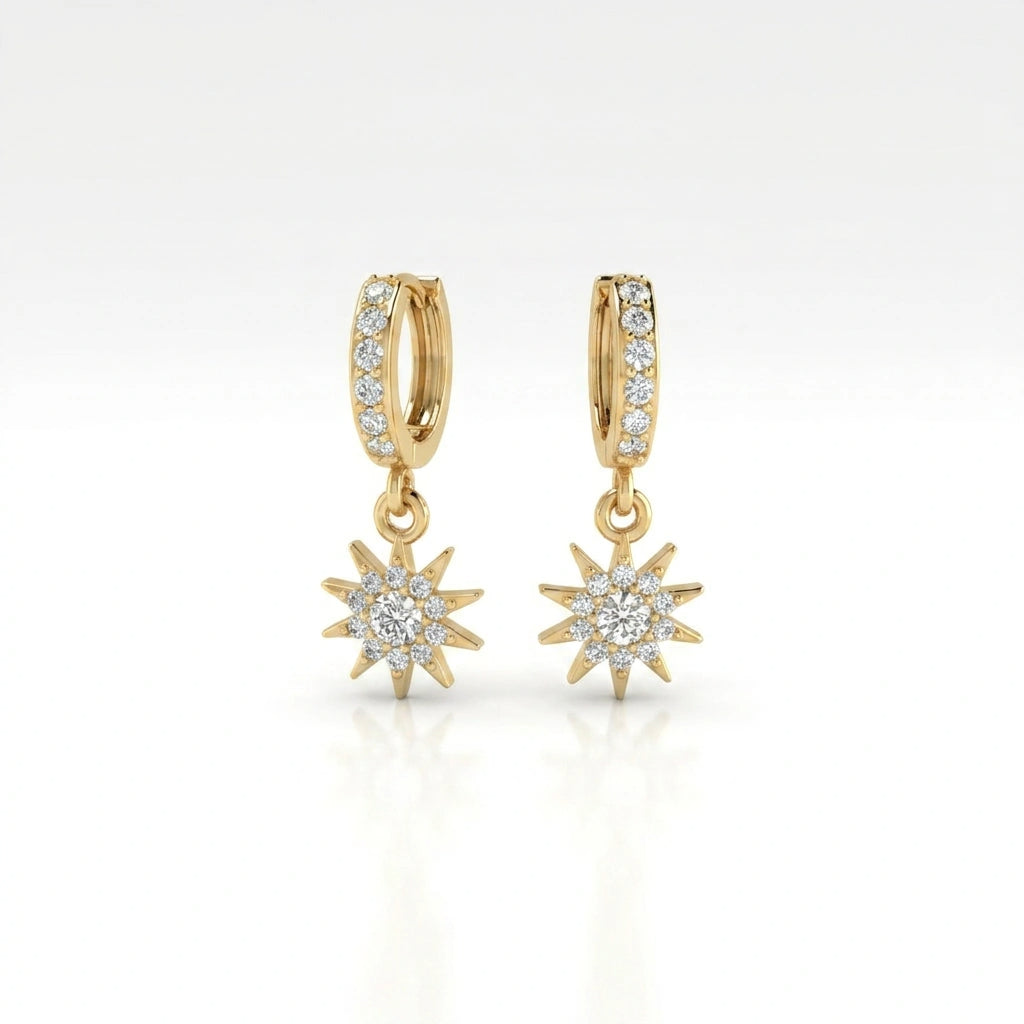 Helion diamond starburst hoop earrings in 14k yellow gold with pavé diamonds and sunburst charm