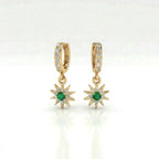 Helion emerald starburst hoop earrings in 14k yellow gold with emerald center and pavé diamond starburst charm