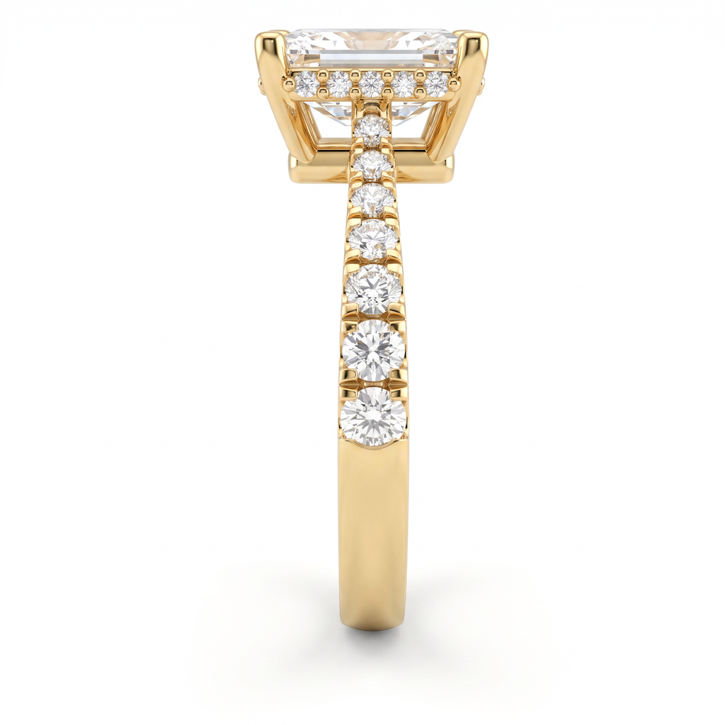 Close-up of the hidden halo and pavé shoulders on a 14K yellow gold Emerald Cut Lab-Grown Diamond engagement ring