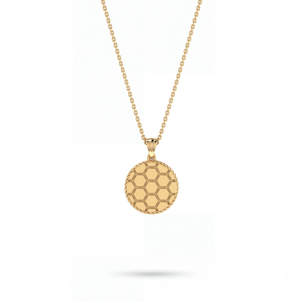 Honeycomb medallion pendant in solid 14K gold, close detail of the hexagon face and rope border — Black Pearl of Queens