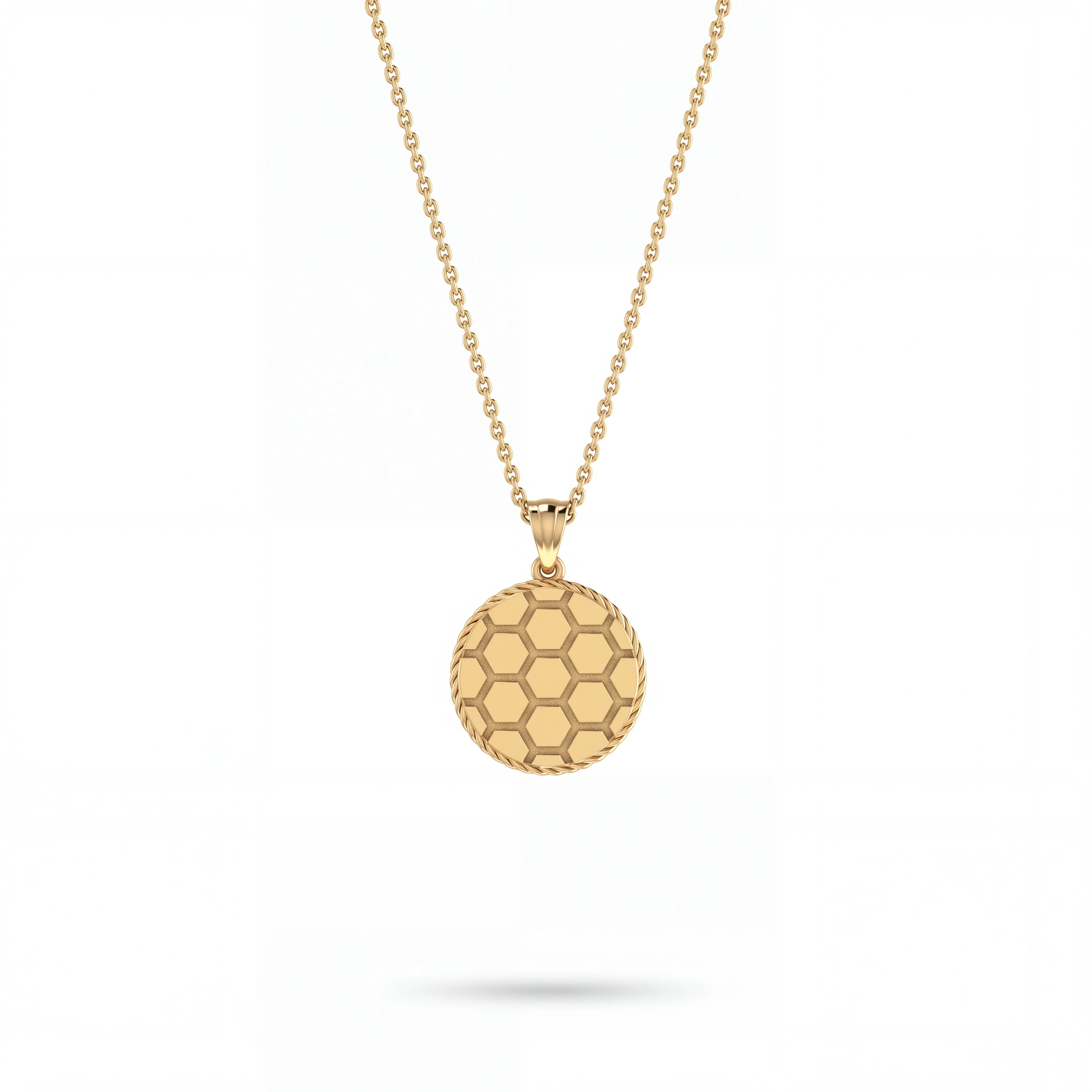 Honeycomb medallion pendant in solid 14K gold, close detail of the hexagon face and rope border — Black Pearl of Queens