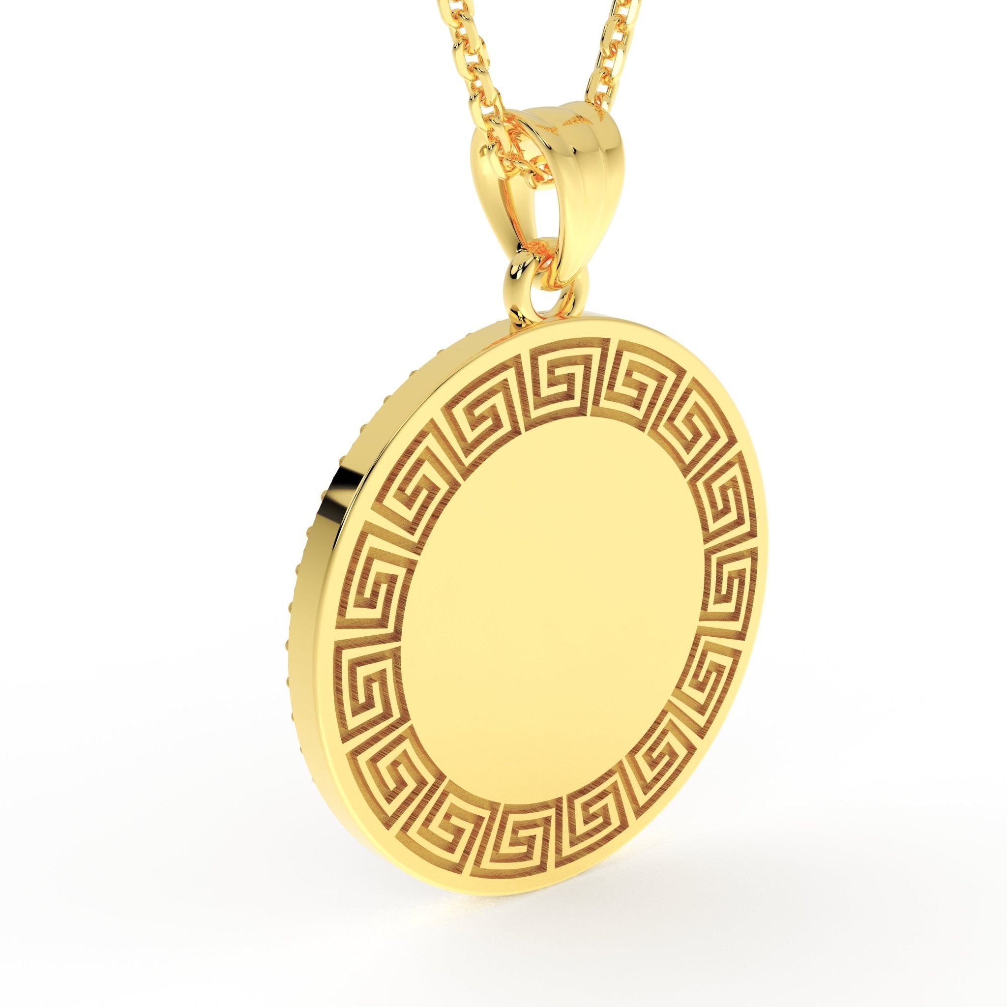 Back view of 14K gold ICXC NIKA pendant with engraved Greek meander border