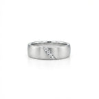 Men’s diamond wedding band in 14K white gold with diagonal channel set round diamonds and matte brushed surface
