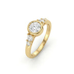 Lab-grown diamond bezel engagement ring in 14K yellow gold, angled view