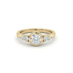 Lab-grown diamond bezel engagement ring in 14K yellow gold with graduated accent diamonds