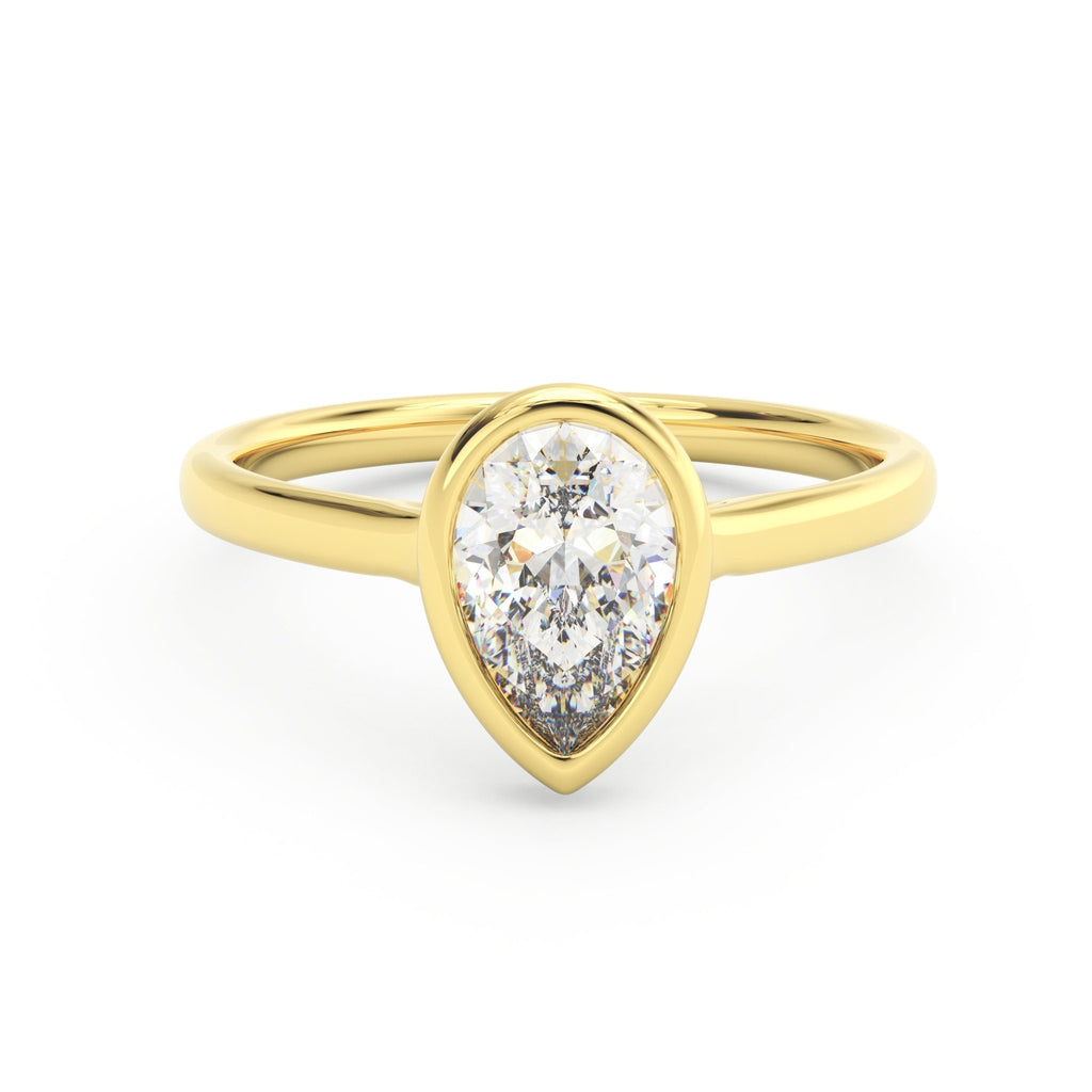 1ct pear bezel set engagement ring in 14k yellow gold