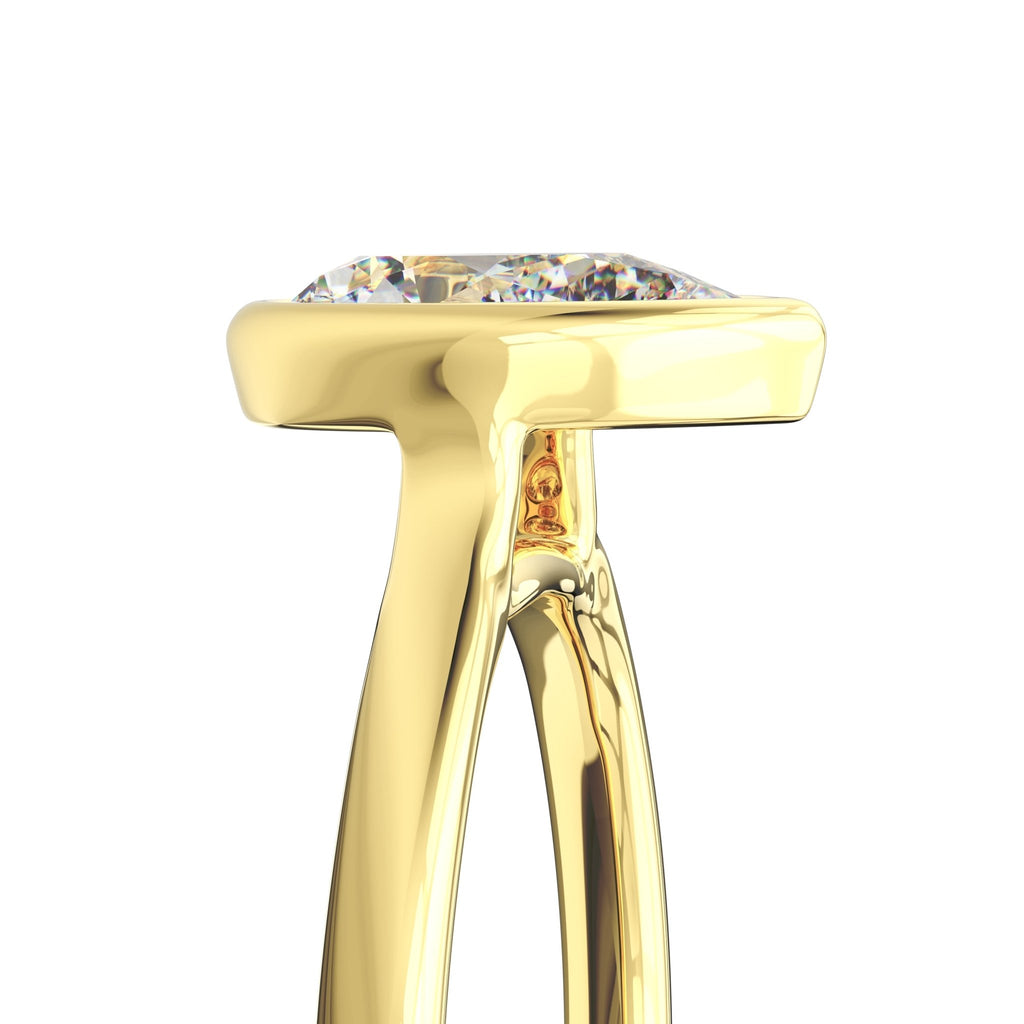 pear cut lab grown diamond ring with minimalist bezel