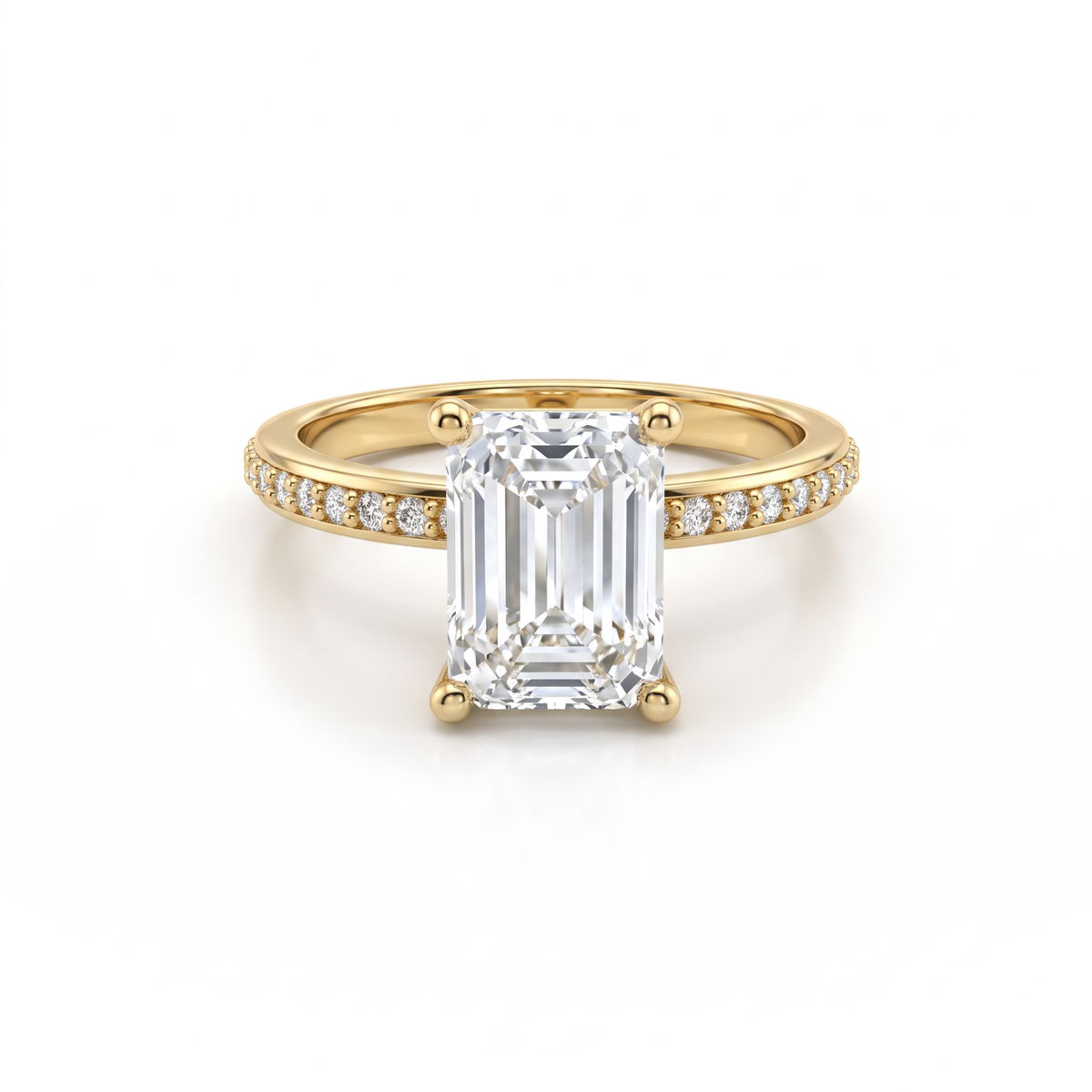 Low Dome Emerald Cut Pavé Engagement Ring with an emerald cut Lab-Grown Diamond in 14K yellow gold