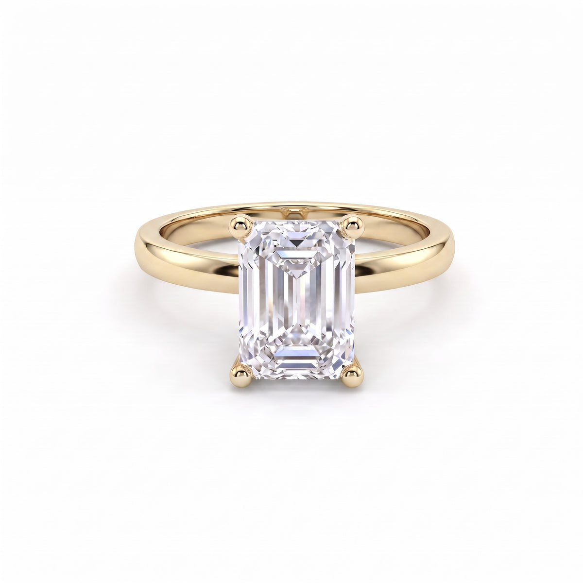 Low Dome Emerald Cut Solitaire Engagement Ring with an emerald cut Lab-Grown Diamond in 14K yellow gold