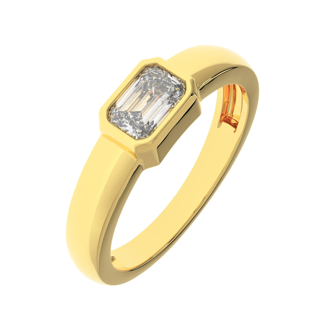 emerald-cut lab-grown diamond bezel diamond ring in 14K yellow gold – angled view