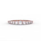 Angled view of a graduated diamond wedding band featuring 0.55 CTW lab grown diamonds 14k rose gold - front view