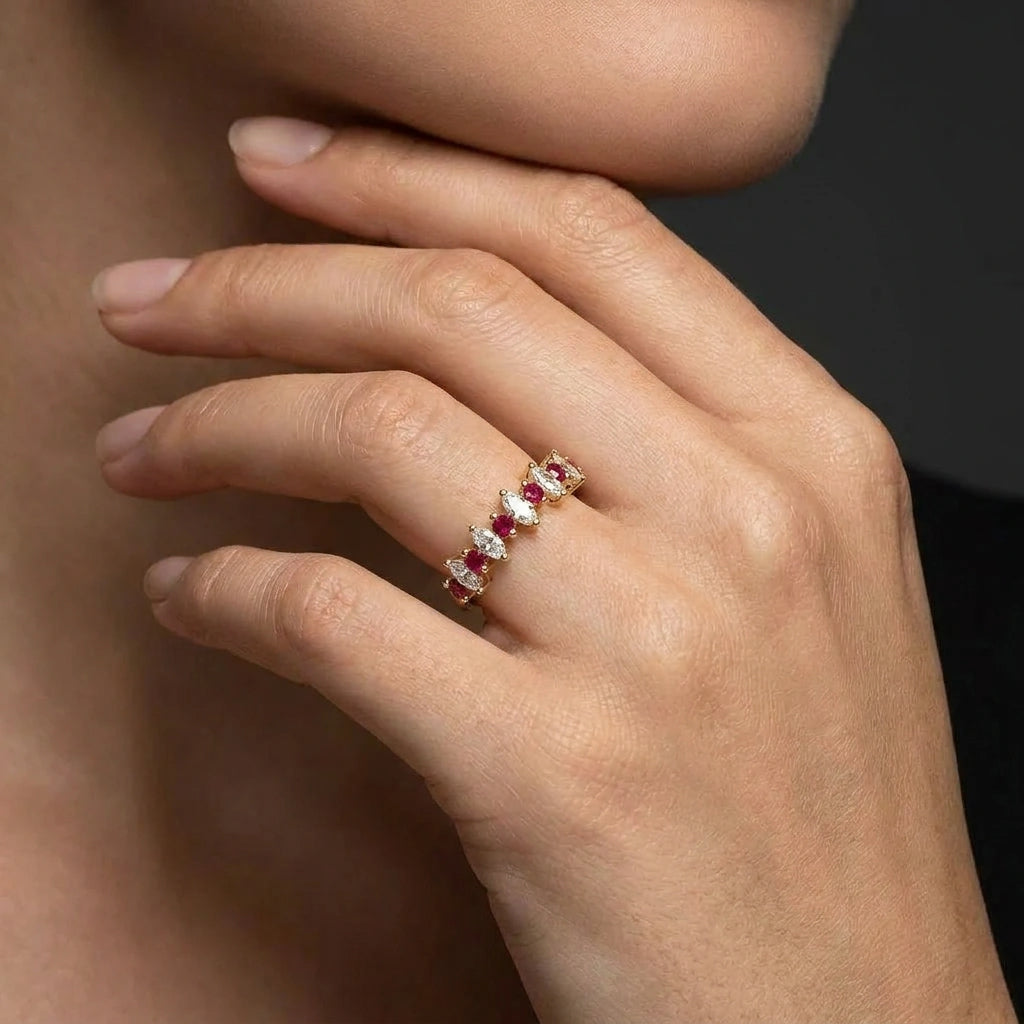 Model wearing a marquise Lab-Grown Diamond and natural ruby alternating band in 14K yellow gold — Black Pearl of Queens