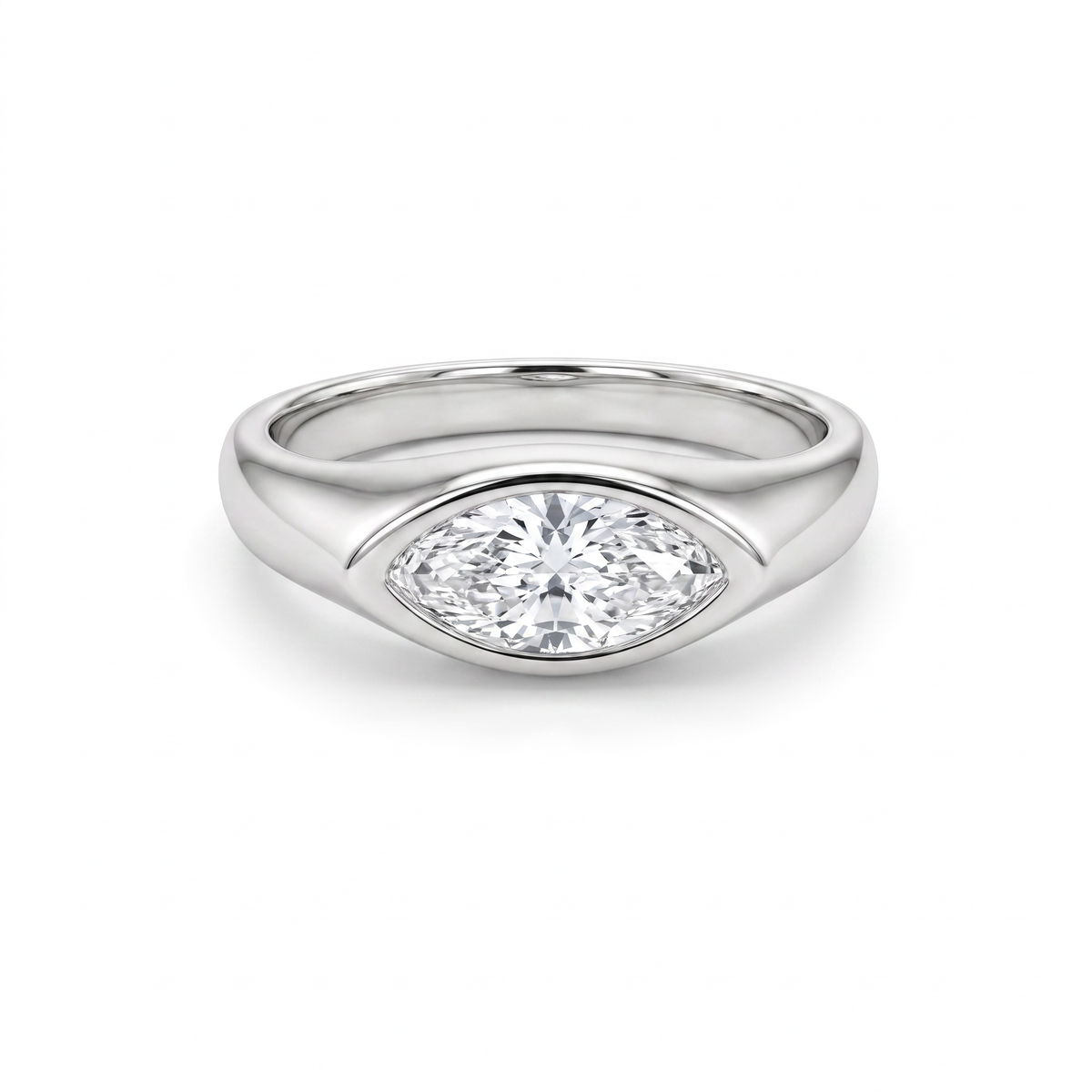 Angled view of the marquise diamond signet ring in 14K yellow gold, showing the domed face and the shank tapering to 3mm