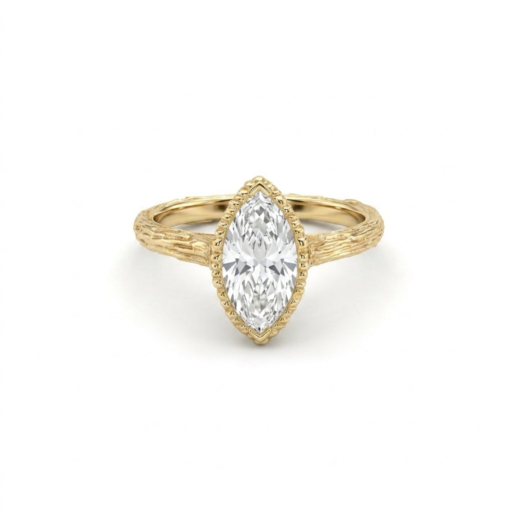 Marquise Lab-Grown Diamond engagement ring with a hand-carved branch band in 14K yellow gold