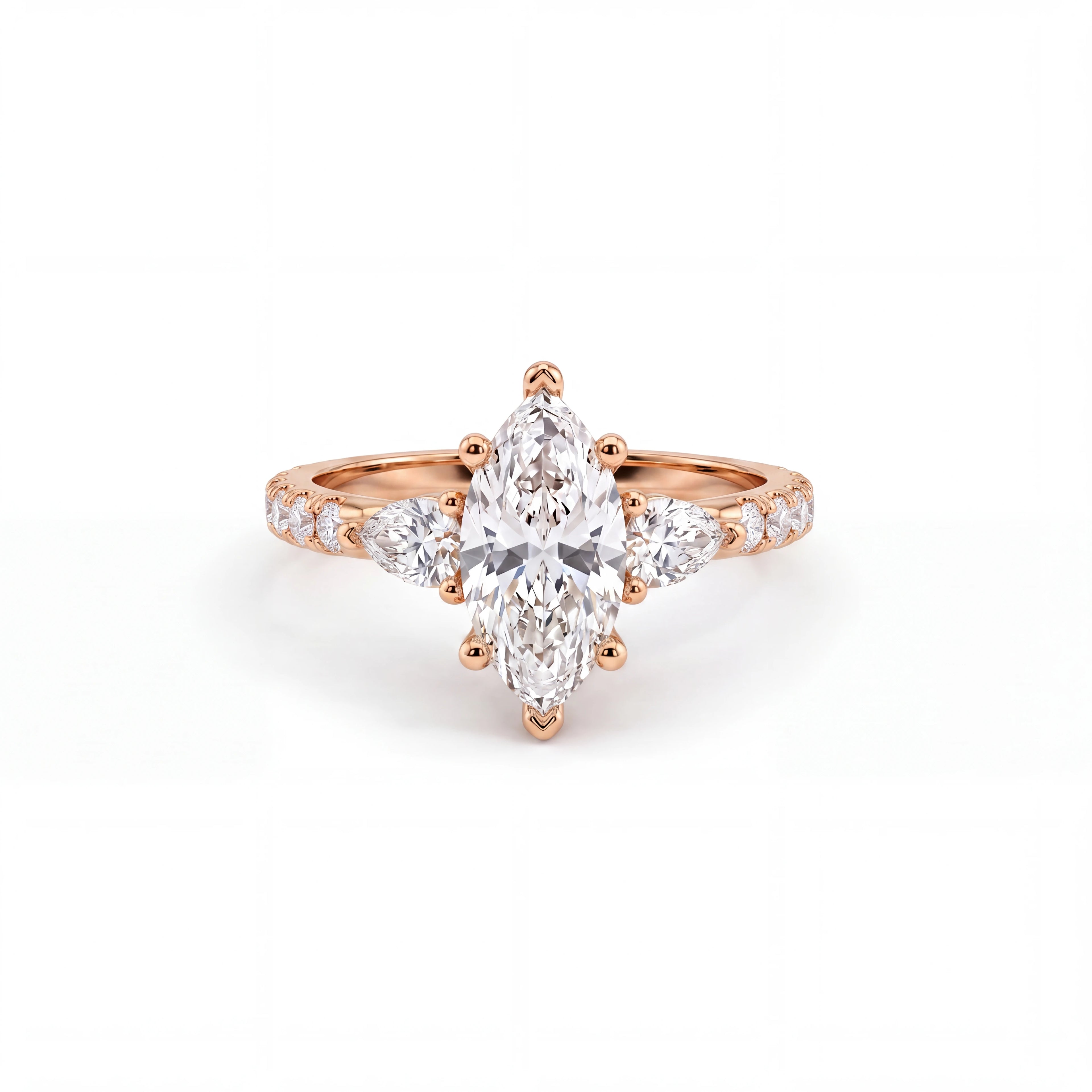 Marquise Lab-Grown Diamond three-stone engagement ring with pear side stones in 14K rose gold, front view — Black Pearl of Queens
