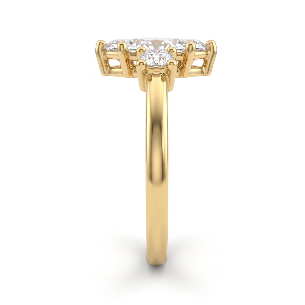 Side profile of marquise three-stone engagement ring in 14K yellow gold showing the prong head and setting height