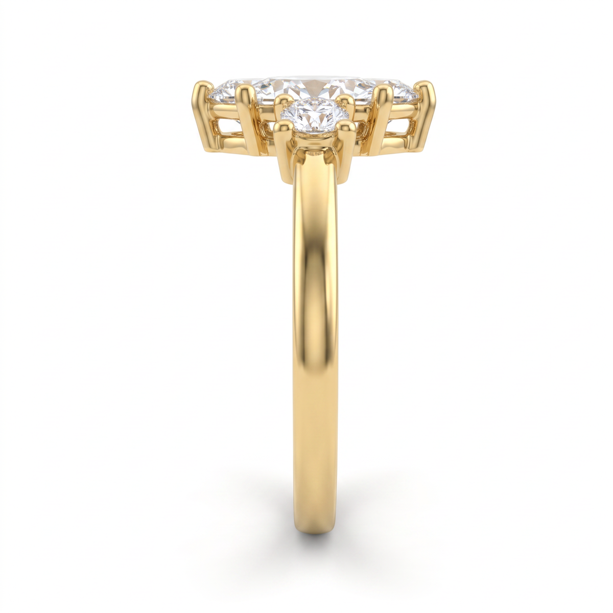 Side profile of marquise three-stone engagement ring in 14K yellow gold showing the prong head and setting height