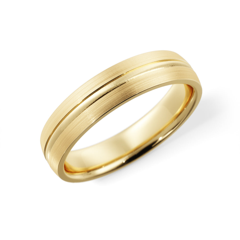 Angled view of men's 5mm brushed gold wedding band with polished groove and comfort-fit interior, 14K yellow gold