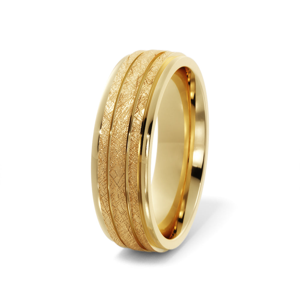 Angled view of men's 7mm ice finish grooved wedding band in 14K yellow gold, polished stepped edge and comfort-fit interior
