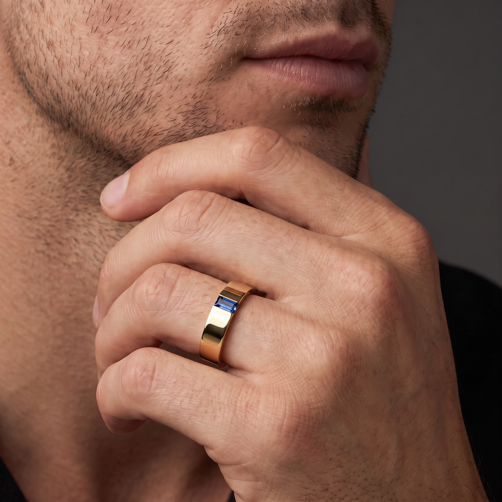 Man wearing a 5mm rose gold wedding band with a blue Lab-Created Sapphire baguette