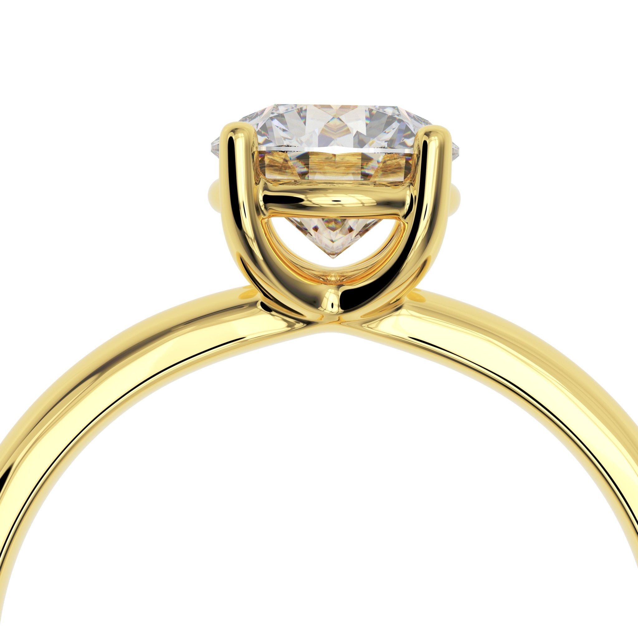 Side view of 1ct round diamond solitaire with open gallery in 14K gold