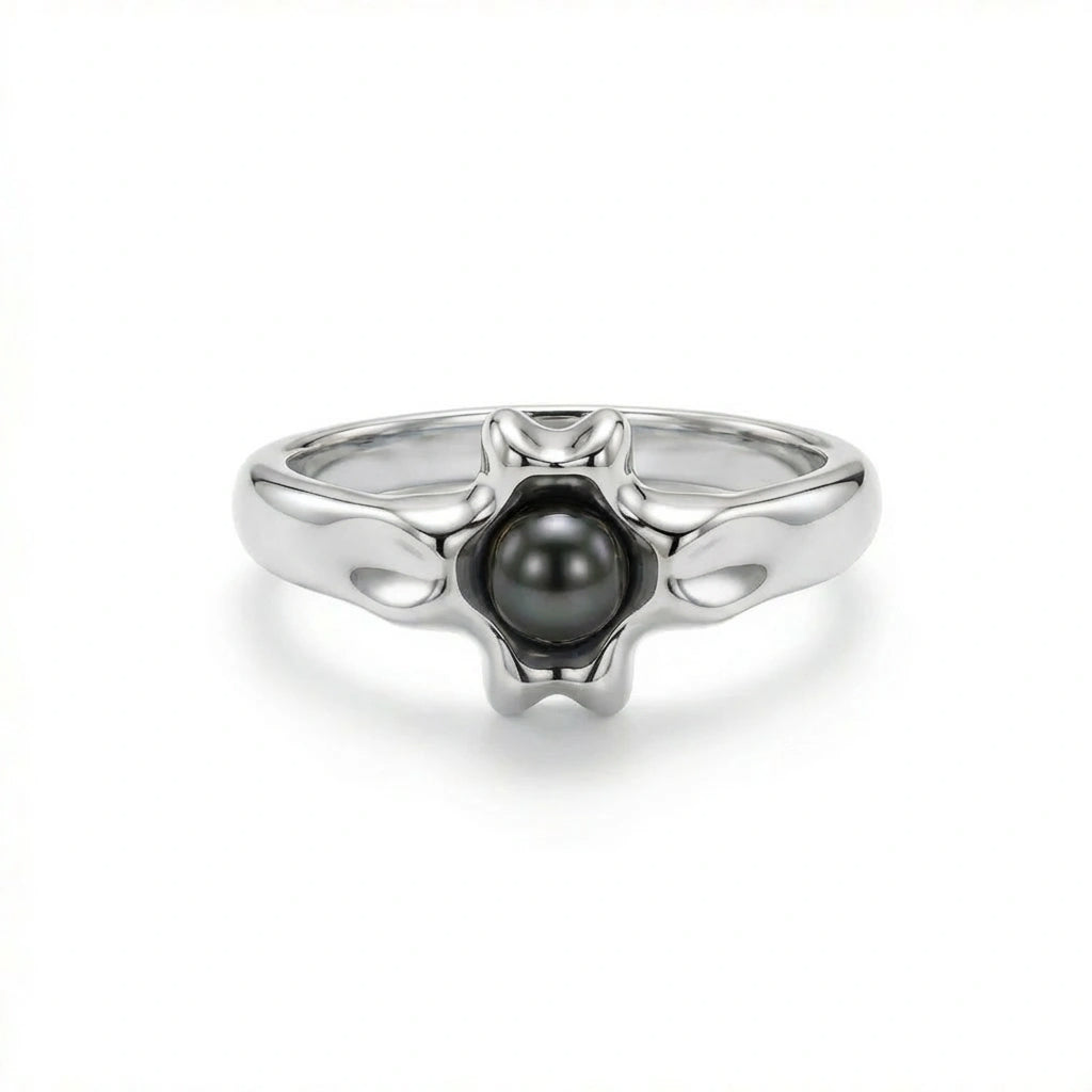 Noir Astra Black Pearl Ring in solid 14K white gold, black pearl centerpiece with sculptural starburst design