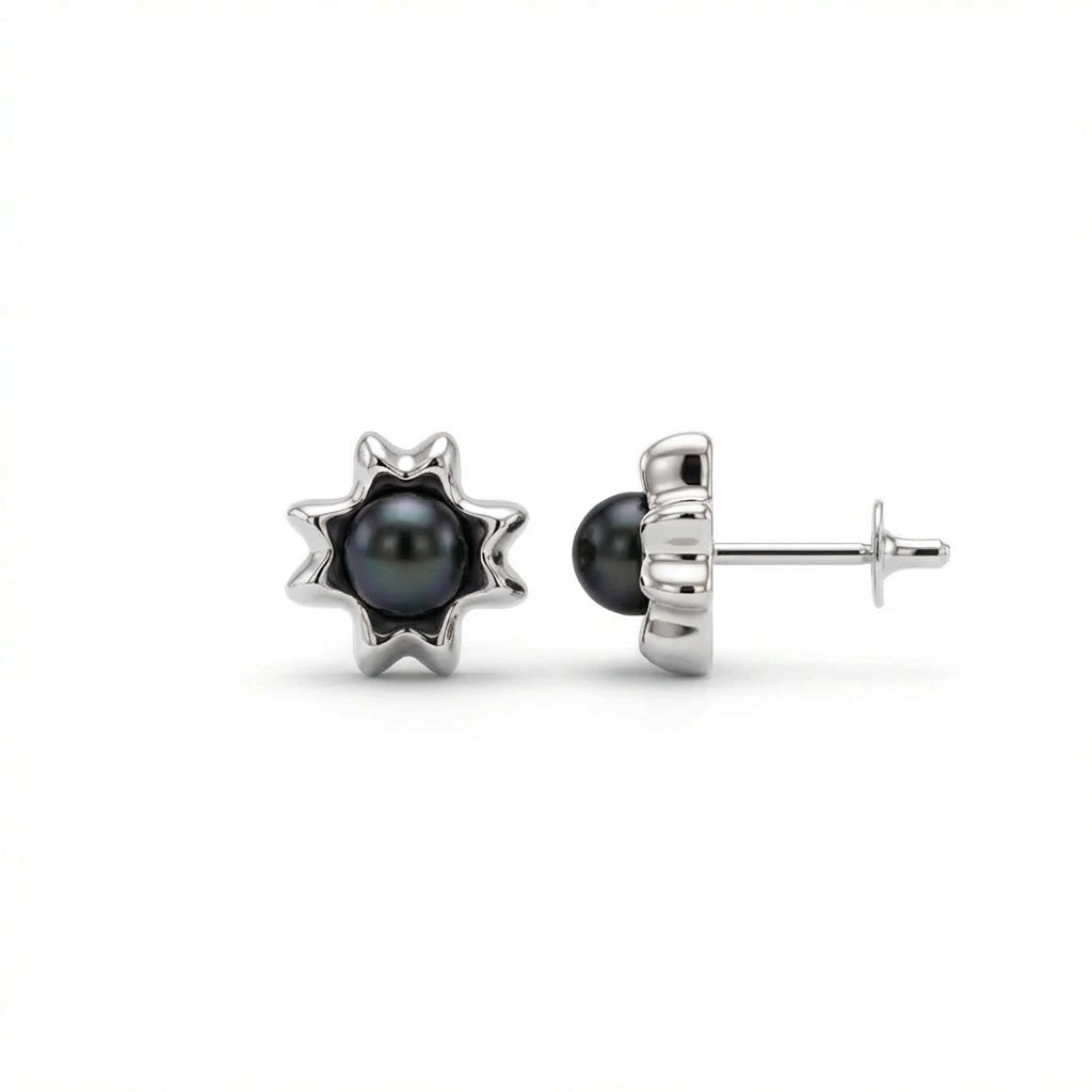 Noir Astra Black Pearl Stud Earrings in solid 14K white gold, black pearl centerpiece with sculptural starburst setting
